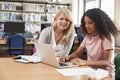 College Student Has Individual Tuition From Teacher In Library Royalty Free Stock Photo