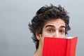 College student reading an interesting book Royalty Free Stock Photo