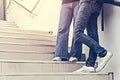College student stand on the staircase Royalty Free Stock Photo