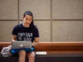 College student uses laptop at Musee d`Orsay, Paris, France Royalty Free Stock Photo