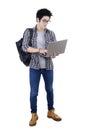 College student uses laptop in the studio Royalty Free Stock Photo