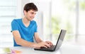 College student using his laptop Royalty Free Stock Photo