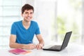 College student using his laptop Royalty Free Stock Photo