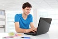 College student using his laptop Royalty Free Stock Photo