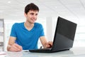 College student using his laptop Royalty Free Stock Photo