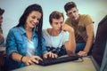 College students sitting in a classroom, using computers Royalty Free Stock Photo