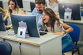 Students sitting in a classroom, using computers during class Royalty Free Stock Photo