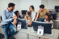 Students sitting in a classroom, using computers during class Royalty Free Stock Photo