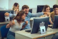 Students sitting in a classroom, using computers during class Royalty Free Stock Photo