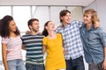 College students standing with arms around Royalty Free Stock Photo