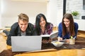 College students studying together at home. Royalty Free Stock Photo