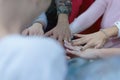 College Students Teamwork Stacking Hand Concept. Close up of young people putting their hands together. Friends with stack of Royalty Free Stock Photo