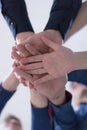 College Students Teamwork Stacking Hand Concept. Close up of young people putting their hands together. Friends with stack of Royalty Free Stock Photo