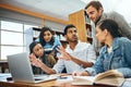 College, talking and students studying in a library for a group project, teamwork and education. Diversity, laptop and Royalty Free Stock Photo