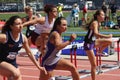 College women running hurdle race