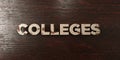 Colleges - grungy wooden headline on Maple - 3D rendered royalty free stock image