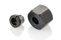 A collet chuck with a clamping nut. Components used in routers and other rotary tools to securely hold bits Royalty Free Stock Photo