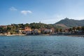 Collioure view from the other side of the bay with Fort of Saint Elme on the top of the village and the beach Royalty Free Stock Photo