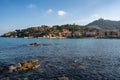 Collioure view from the other side of the bay with Fort of Saint Elme on the top of the village Royalty Free Stock Photo