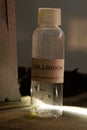 Collodion in labeled glass jar. Royalty Free Stock Photo