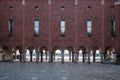 The collonnade arch passage and brick facade at the Town City hall of Stockholm