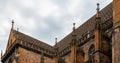 Colmar in Alsace, France. Collegiate Church of San Martino, one of the symbols of the city on the canals. Royalty Free Stock Photo