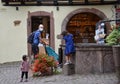 Colmar, France, August 31, 2020: Caucasian man with his daughters and wearing protective covid-19 face mask. Touristy spots in the