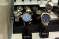 luxury watches by Hugo BOSS in a jewelry store showroom
