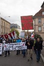 People protesting against the sanitary pass with text in french : fausse pandemic, vraie dictature, in english : false pandemic, t