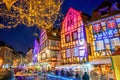 Christmas illumination on a street in Colmar Old town, Alsace, France Royalty Free Stock Photo