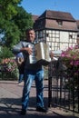 Portrait of a accordionist playing in the street