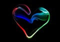 Coloful heart made of smoke, on black background Royalty Free Stock Photo