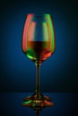 Coloful wineglass on table. Royalty Free Stock Photo