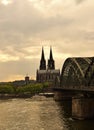Cologne Cathedral and Hohenzollern Bridge at dusk, Germany Royalty Free Stock Photo