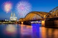 Cologne Cathedral and Hohenzollern Bridge with Fireworks Royalty Free Stock Photo