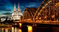 Cologne Cathedral and Hohenzollern Bridge at night/ twilight , Cologne, Germany Royalty Free Stock Photo