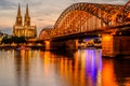 Cologne Cathedral and Hohenzollern Bridge at sunset, Germany Royalty Free Stock Photo