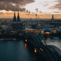 Cologne Cathedral Koelner Dom and Hohenzollern Bridge through Rhine river Royalty Free Stock Photo