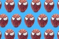 Cologne, Germany - April 13, 2020: Colorful painted spiderman Easter egg pattern in blue isolated background