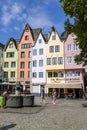 Fountain Fish shops against a backdrop of beautiful houses in the center of Cologne