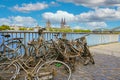 Pile many old muddy rusty bicycles thrown into the rhine and then salvaged