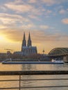 Cologne Germany alongside the rhein river during sunset with the huge Cathedral Royalty Free Stock Photo