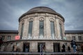 COLOGNE, GERMANY - NOVEMBER 6, 2022: Main building of Koln Messe Deutz Bahnhof train station with passengers passing. It\'s a Royalty Free Stock Photo