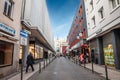 COLOGNE, GERMANY - NOVEMBER 12, 2022: Panorama of the Hamergasse Strasse, empty, with shops and stores. Hamergasse Strasse is a