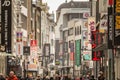 COLOGNE, GERMANY - NOVEMBER 5, 2022: Selective blur on a crowd of people walking on Hohe Strasse street with shops & stores. hohe Royalty Free Stock Photo