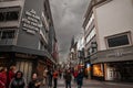 COLOGNE, GERMANY - NOVEMBER 5, 2022: Selective blur on a crowd of people walking on Hohe Strasse street with shops & stores. hohe Royalty Free Stock Photo