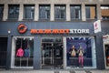 COLOGNE, GERMANY - NOVEMBER 12, 2022: Selective blur on a logo of mammutstore on their Cologne Boutique. Mammut is a swiss Royalty Free Stock Photo