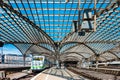 Cologne Koln, Germany: Cologne Central Railway Station Historical Nineteenth Century Architecture against Blue Sky with Train