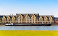 Cologne Koln, Germany: Siebengebirge Building at Cologne Rheinauhafen, with Ship Cargo on Rhine Rhein River