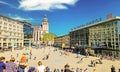 View over busy square on central train station entrance in summer Royalty Free Stock Photo